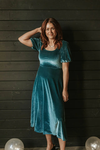 Flattering and comfortable velvet dress with puff sleeves. www.loveoliveco.com