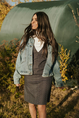 black and white boxy fit dress layered with a turtleneck and denim jacket. www.loveoliveco.com