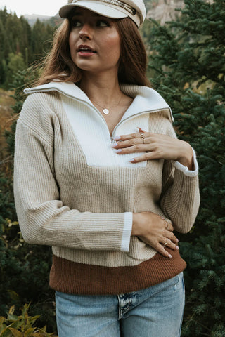 chunky sweater with a three color tone and a v-neck zipper feature. www.loveoliveco.com