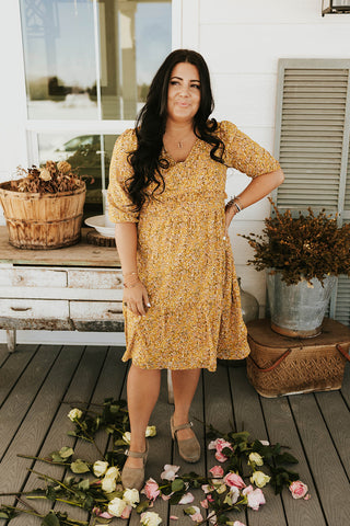 knee length floral dress in mustard.  www.loveoliveco.com