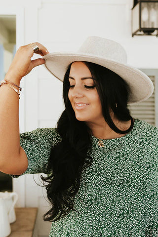cream wide brimmed hat. www.loveoliveco.com