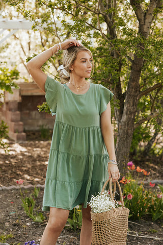 flowy green dress you'll love. www.www.loveoliveshop.com