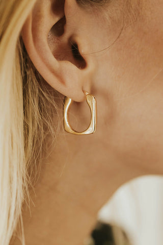 gold oval hoop earrings. www.loveoliveco.com