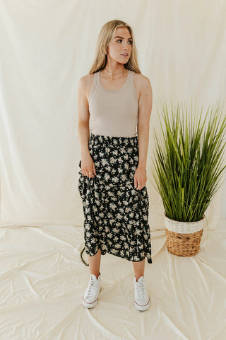 Fitted neutral tank and floral maxi skirt. www.loveoliveco.com