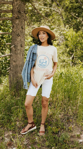 cute graphic tee with jean jacket and hat. www.loveoliveco.com