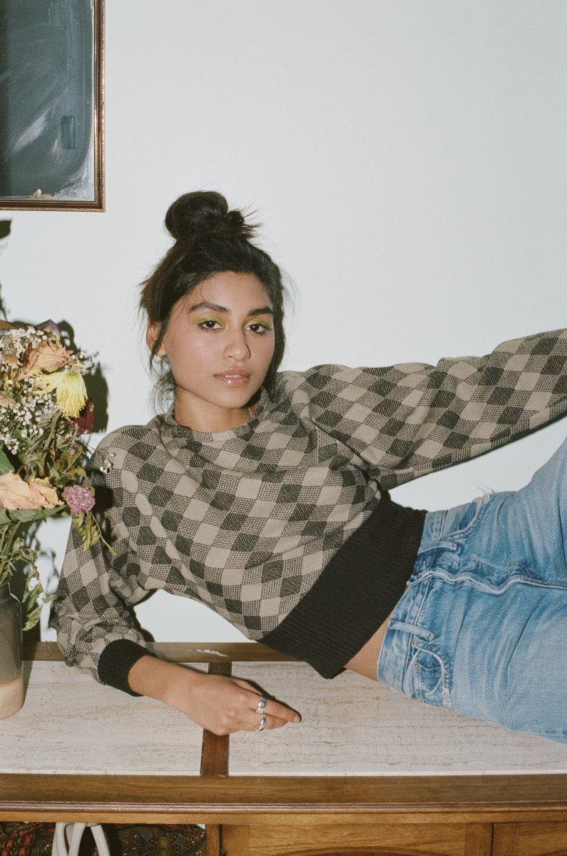 Alvina reclining on table with placemats 