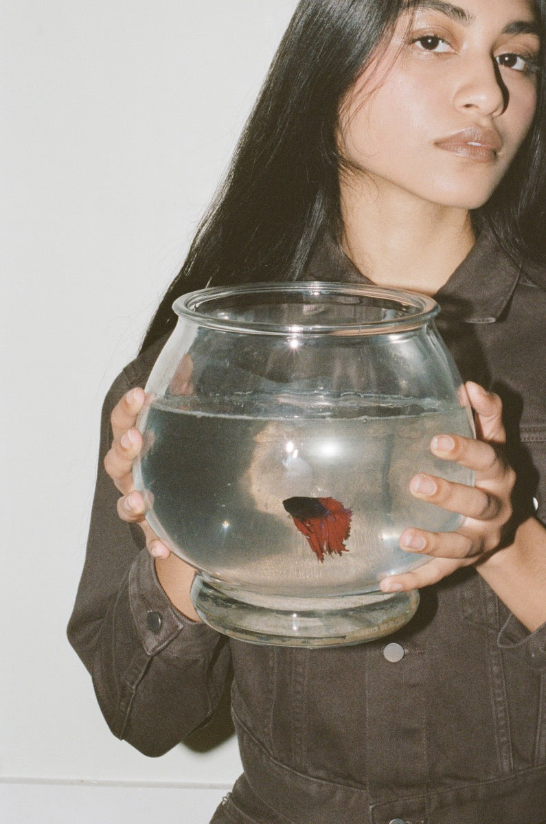 Alvina holding goldfish in fish bowl