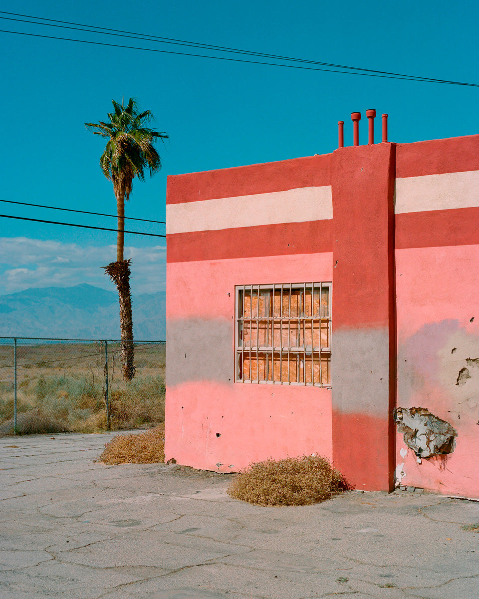 Abandoned roadside attraction in desert