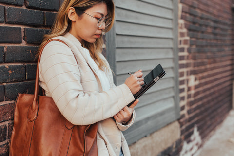 A girl on an iPad.