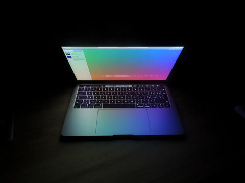 laptop screen blue light dark room
