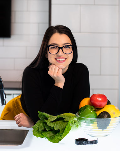 A girl in the kitchen.