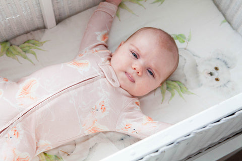 baby in pink onesie