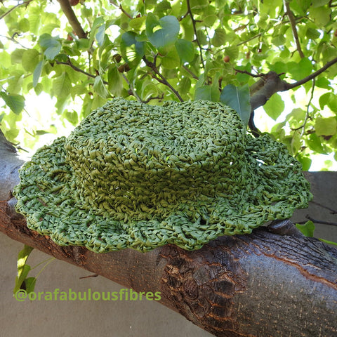 hat crocheted from paper yarn - raffia based