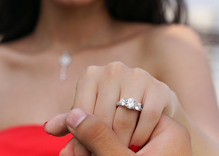 Three stone American diamond engagement ring