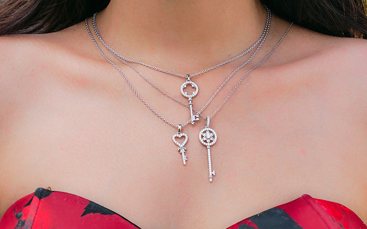 Girl with multiple sterling silver necklaces