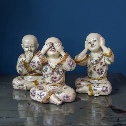 three wise monks figurines