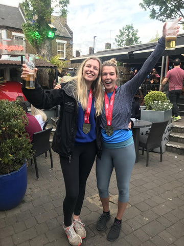 Celebrating after finishing the london marathon