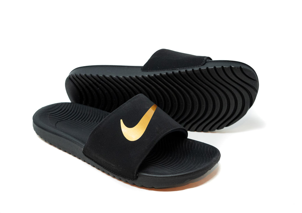 nike kawa slides black and gold