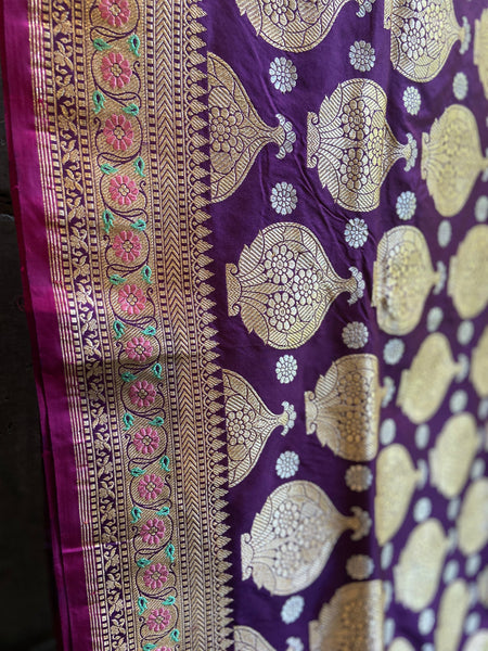 A magnificent saree in kadhwa weave. A purple banarasi saree with mughal motifs in gold and silver zari and a delicate paithani border with meena work just perfect for the important DAY!  An Iktara saree. Iktara weave is specially woven for the comfort draping. Regular sarees have 2800 count threads and an iktara saree is so light and easy to drape because of the thread count of two thousand. this makes the saree light weight, soft and easy to drape. 