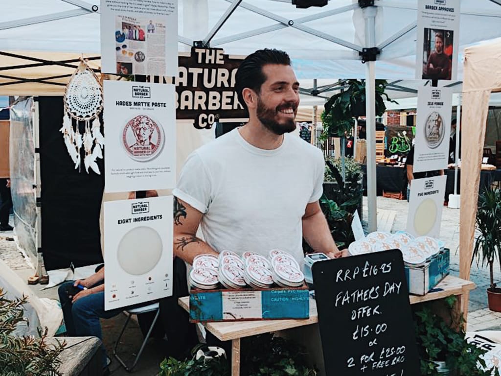 Joe at the market stall