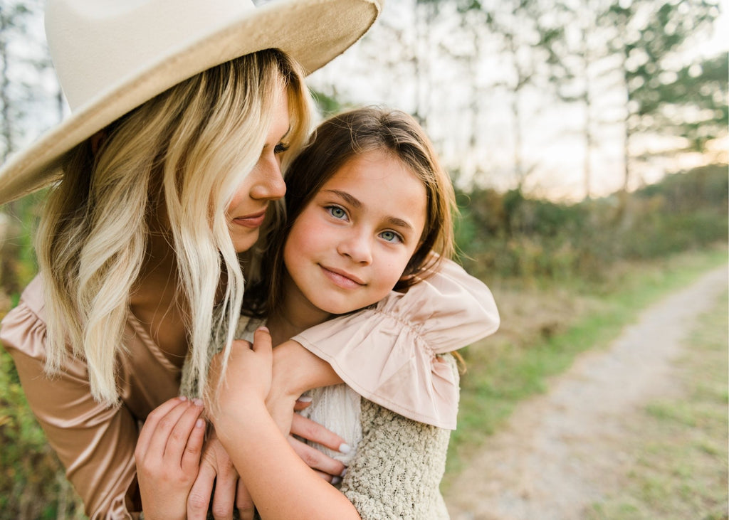 rule of thirds displayed in a photo of a mom holding her daughter close during a family photoshoot