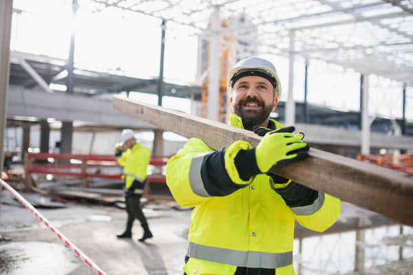 how to lose water weight: hard hat worker smiling while working