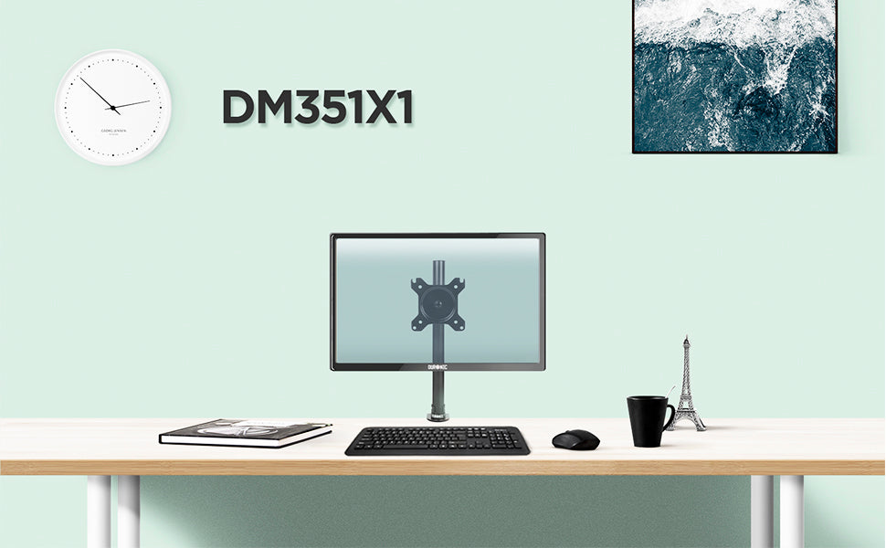 DM351X1 monitor stand on desk top surface, surrounded by office accessories. 