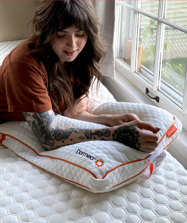 Woman Resting on Pillow