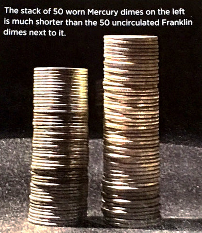 Stack of 50 worn Mercury dimes versus uncirculated coins.