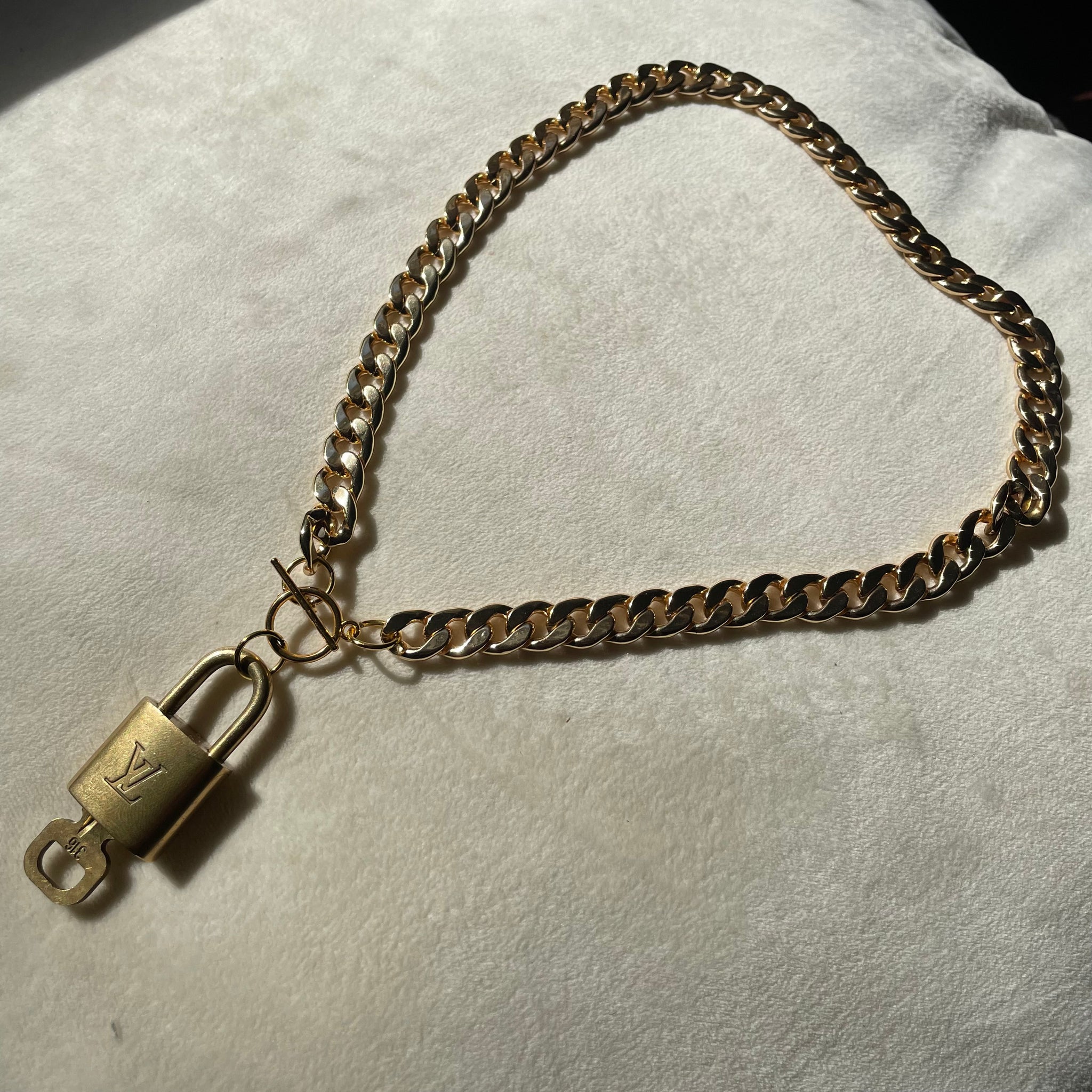 Louis Vuitton Lock  Key Necklace  Jane Doe Boutique Jacksonville