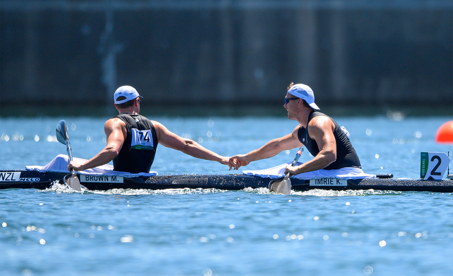 Kurtis Imrie and Max brown celebrating canoe sprint race