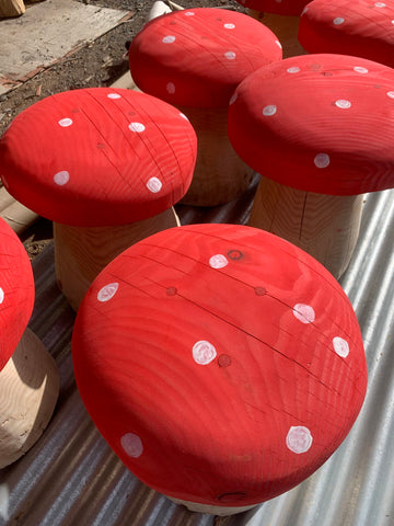 Painted mushroom stools outdoor 