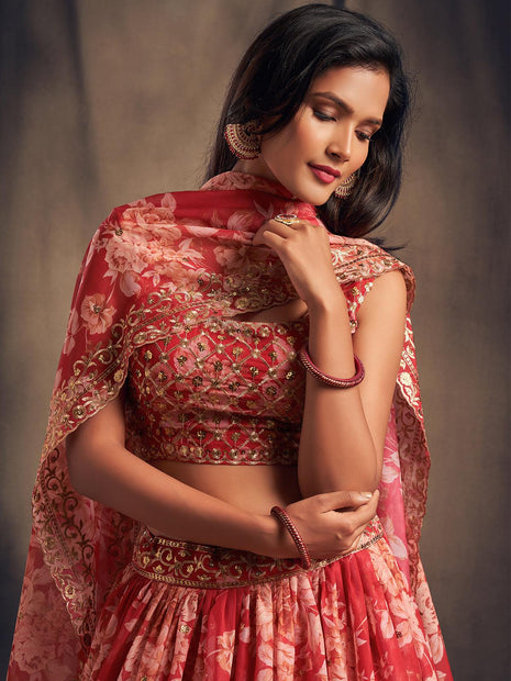 Photo of Bride in red lehenga green jewellery