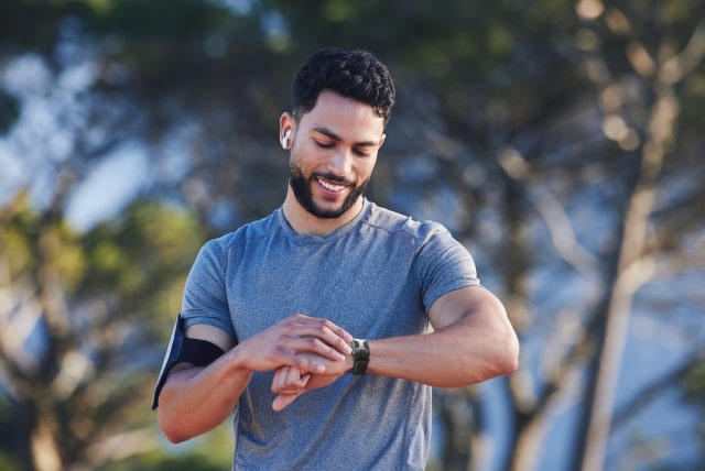 Man running with his Apollo Wearable