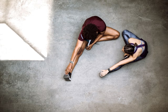 People stretching while wearing Apollo