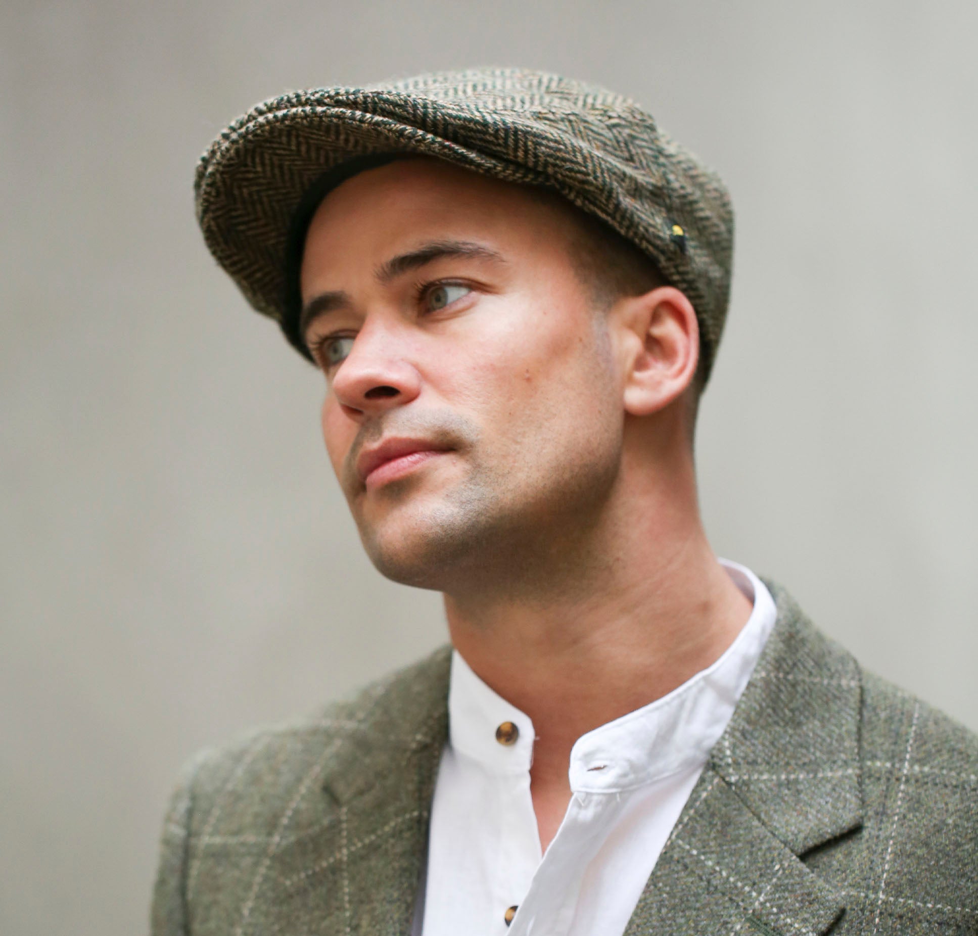 Triona Design | Authentic Donegal Tweed Flat Cap, Olive Green Herringbone