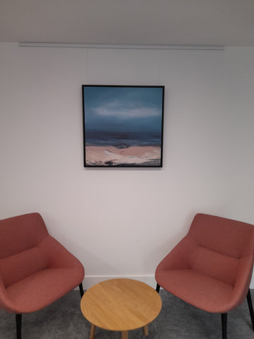 Office art with picture hanging rail