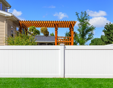 vinyl fence- Fenced-in backyard 