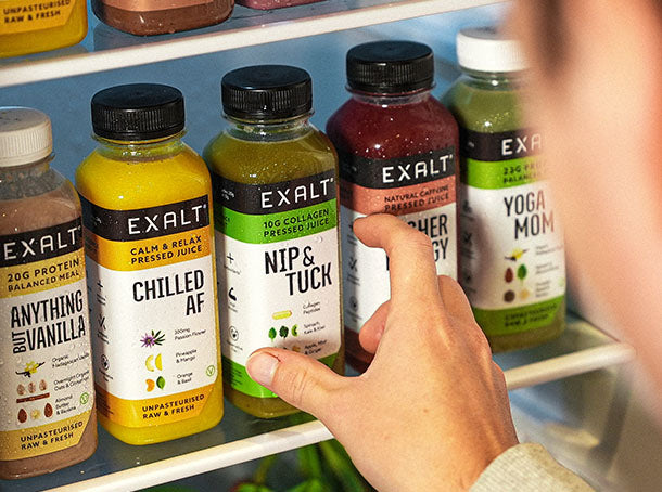a fridge stocked with EXALT green juice