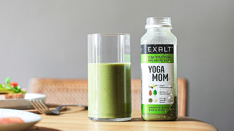 a bottle of EXALT Yoga Mom Meal Replacement