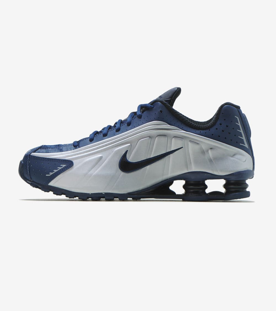 navy blue and grey nike shoes
