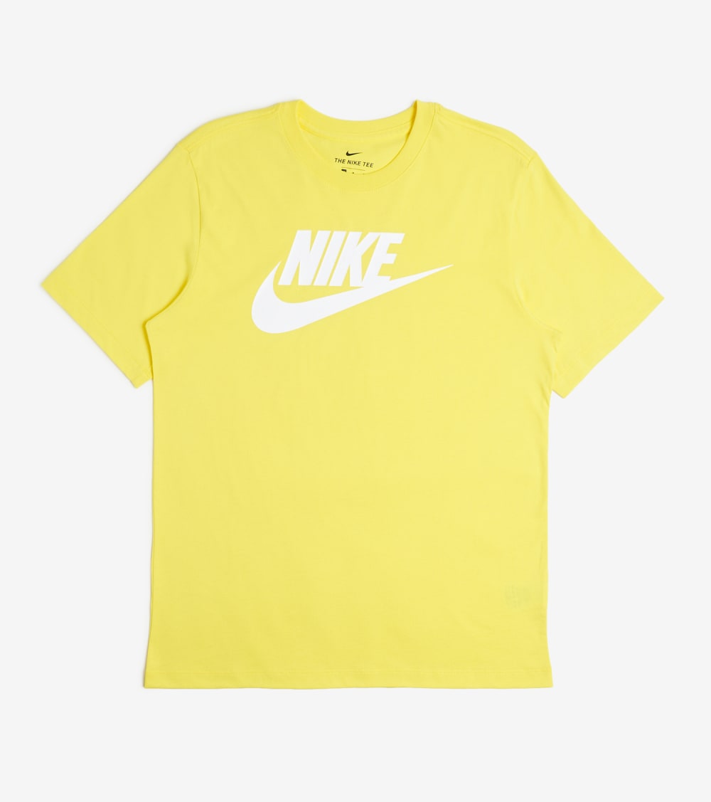 white and yellow nike shirt