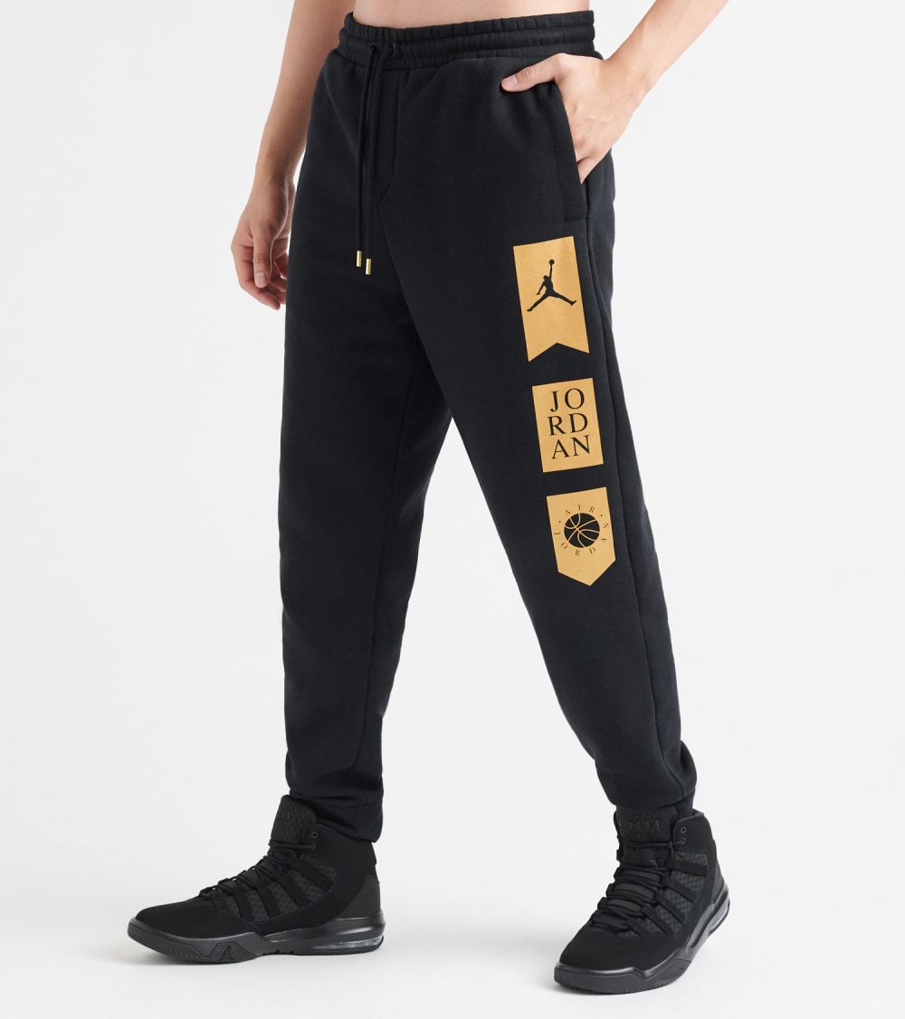 black and gold jordan pants