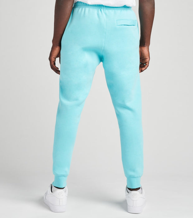 turquoise nike joggers