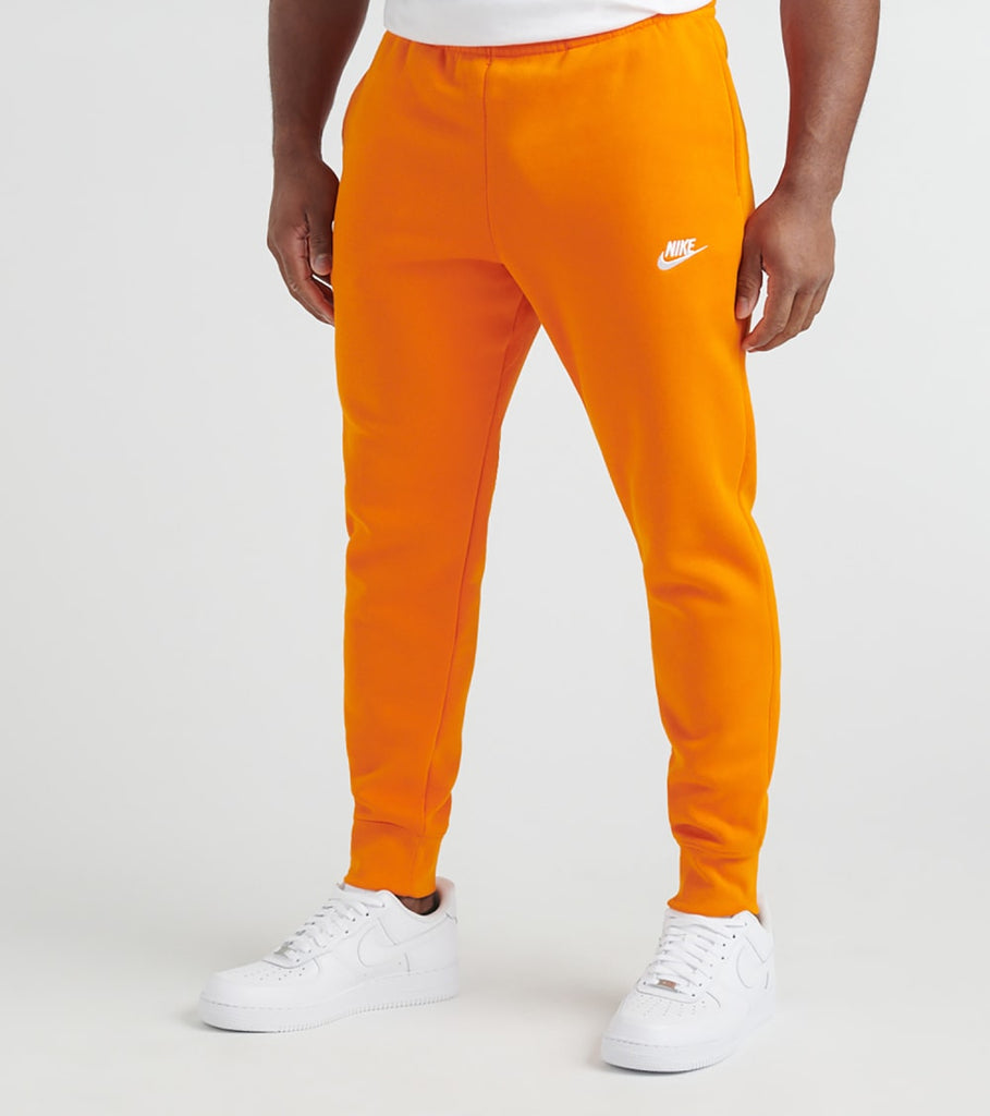 orange nike sweatpants