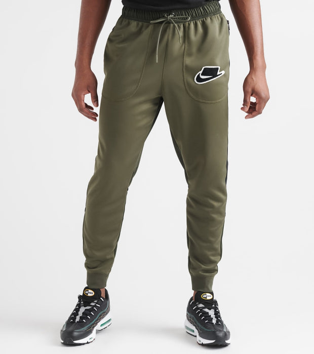 green nike track pants