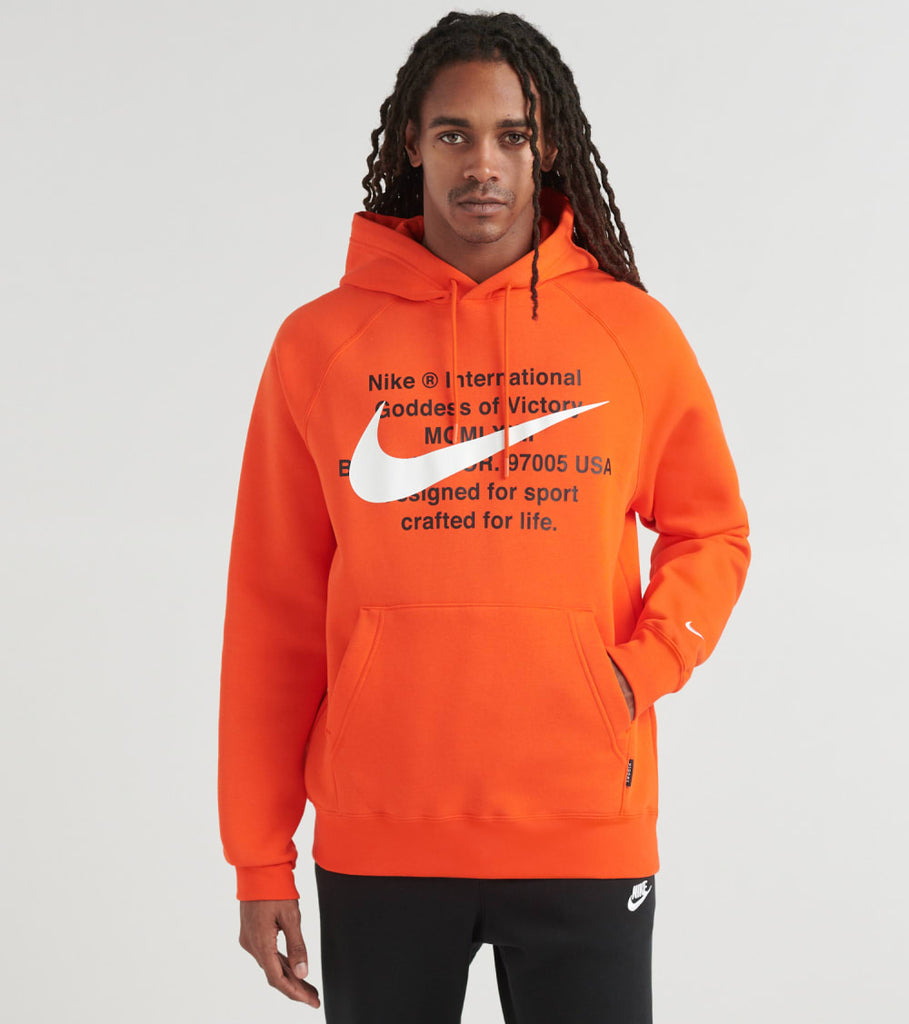 black nike hoodie with orange square