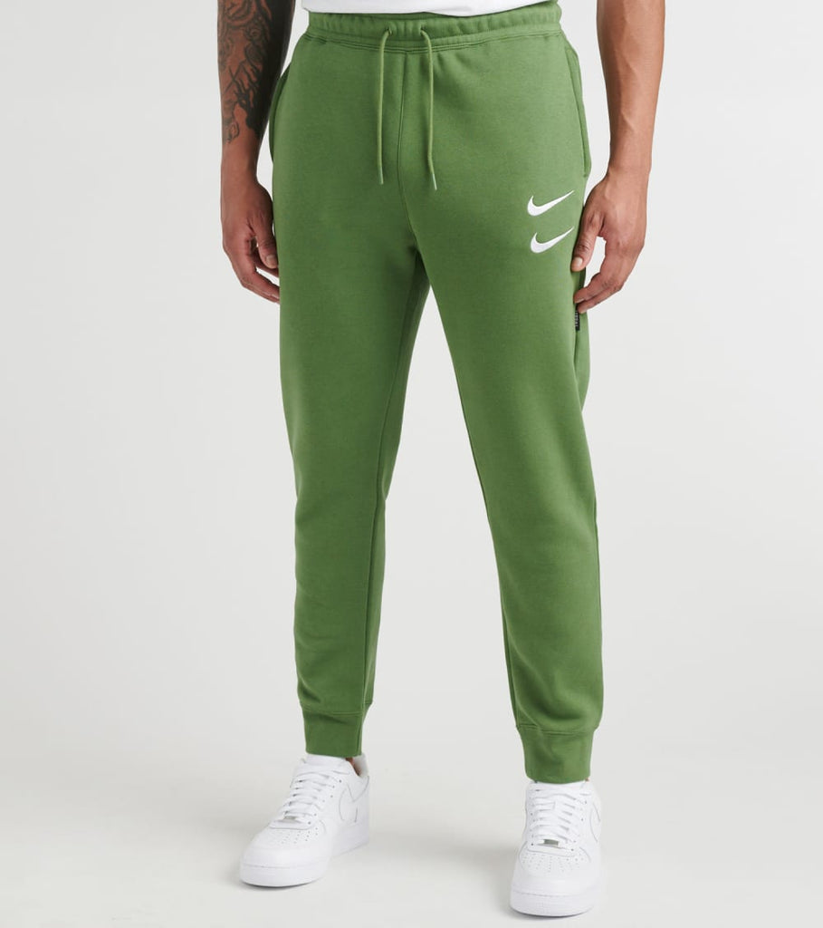 nike green track pants