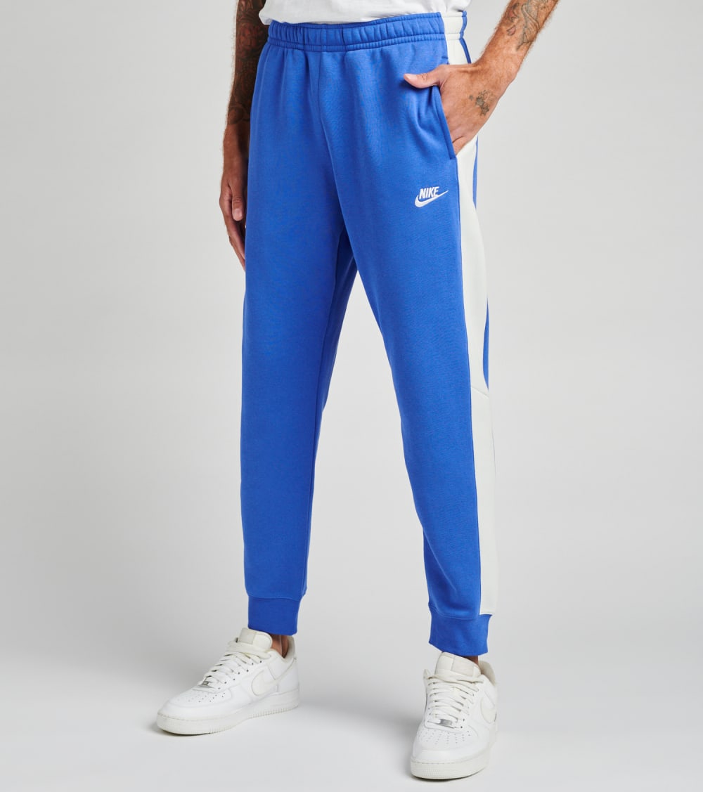 blue and white nike pants