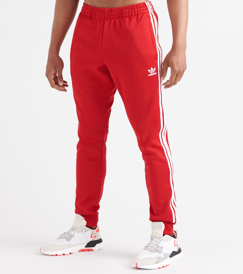 adidas sst track pants red mens